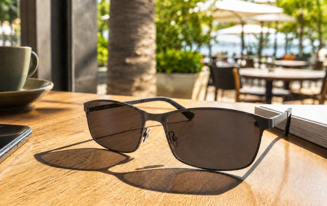 Photochromic lenses with a dark full activation tint